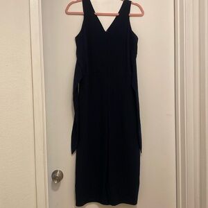 Navy blue Cropped Jumpsuit with waist tie detail.